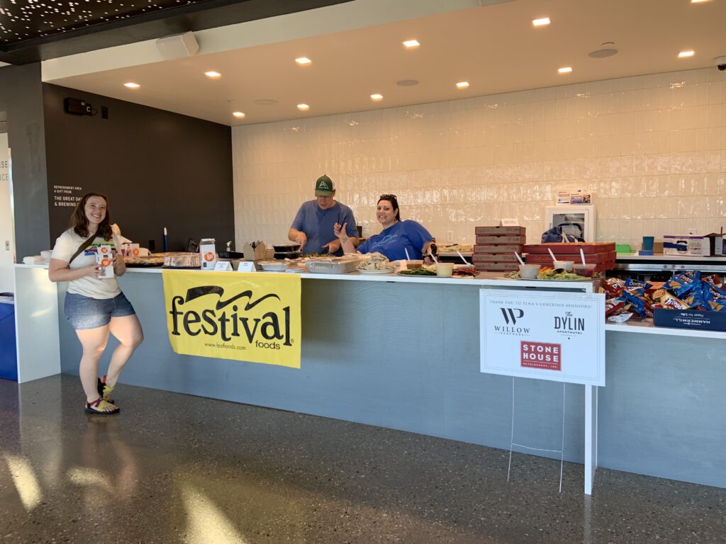 TLNA council members setting up the food for Taste of Tenney